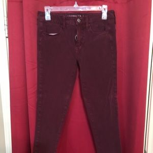 Maroon super stretch American Eagle skinny jeans